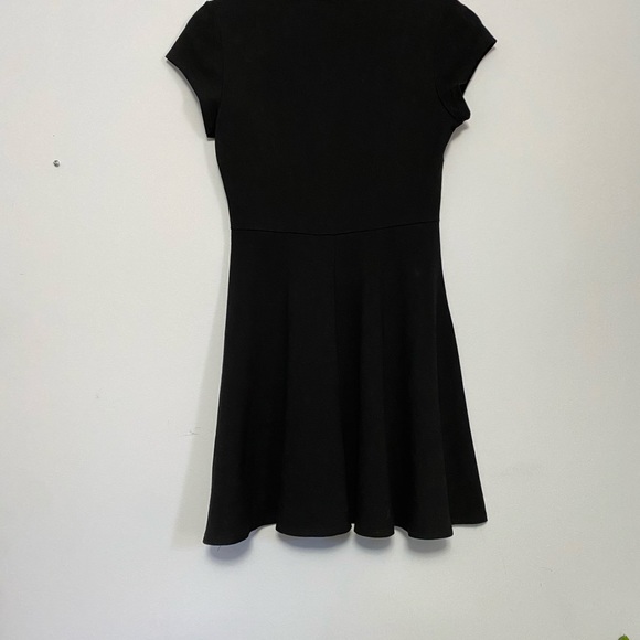 Cute black stretch dress with skater skirt - Picture 3 of 4